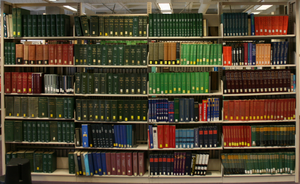 Library shelf with reference works.png